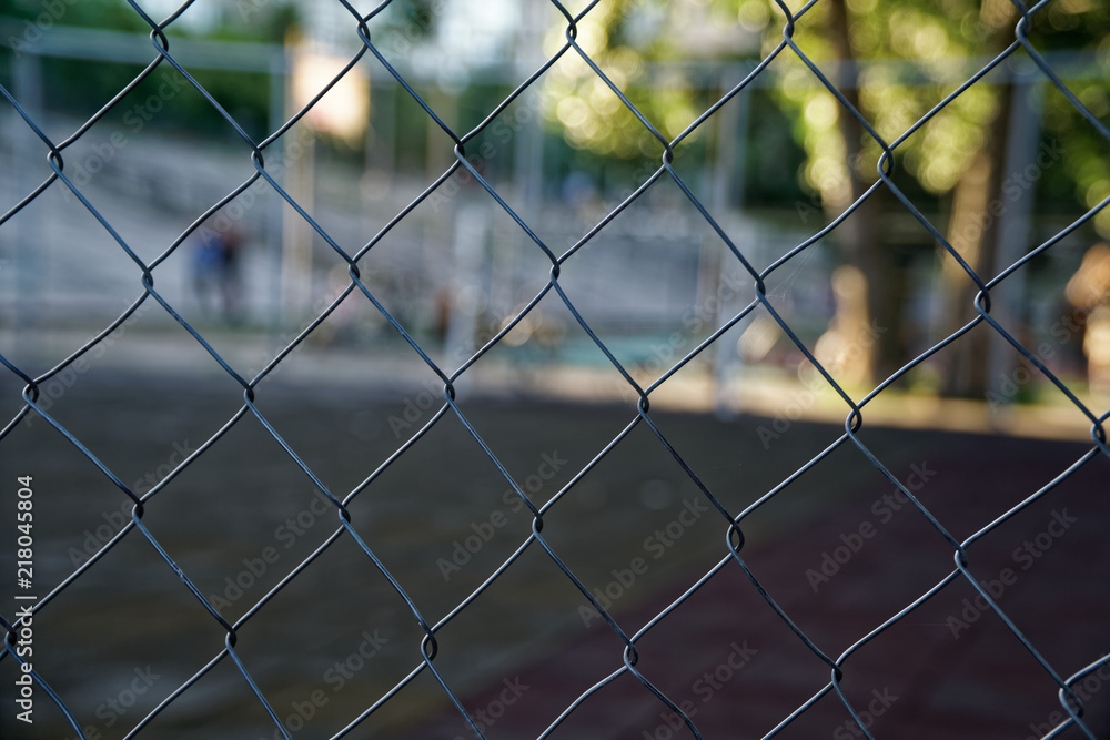 Mesh aluminium wire with defocused background, business concept Mesh aluminium wire with defocused background, business concept