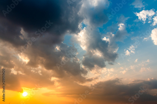 colorful dramatic sky with cloud at sunset..