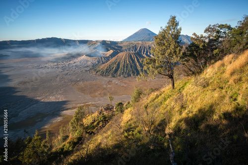The beautiful scenery of fog and volcano in the morning at Bromo Tengger Semeru National Park, Indonesia.