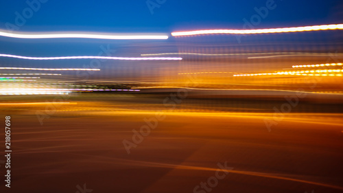 Photo in motion at night as an abstract background