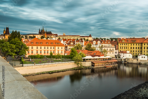 The first morning sun on the roofs of old Prague