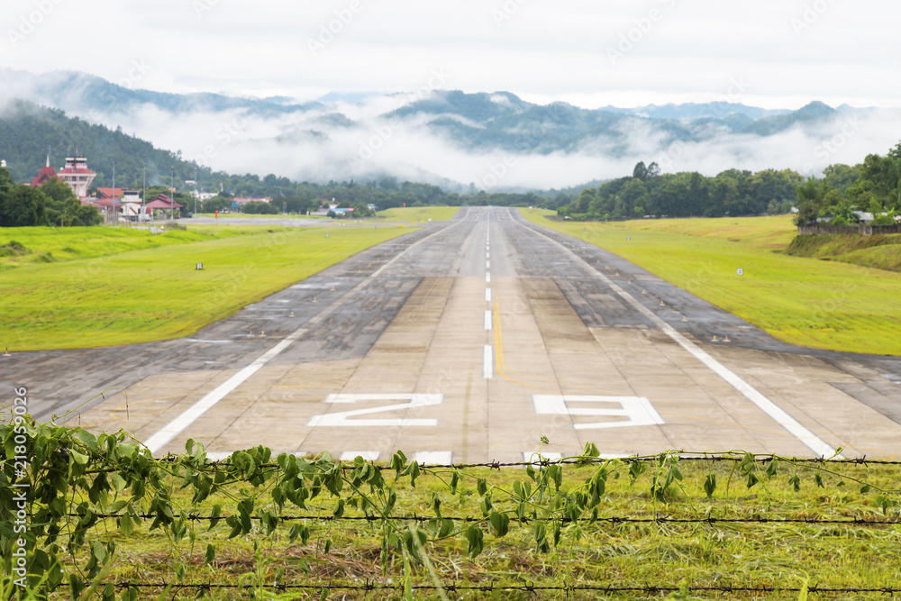 Mae Hong Son, Thailand January 18, 2018 : Airport runway in the morning sunrise time.