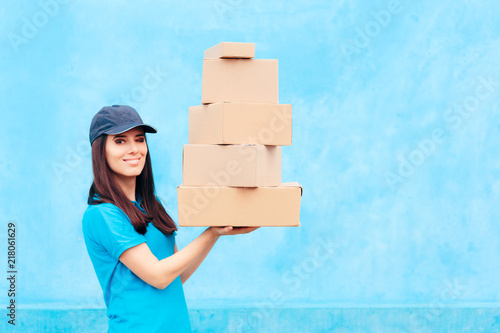 Distribution Service Delivery Worker Holding Many Cardboard Packages  photo