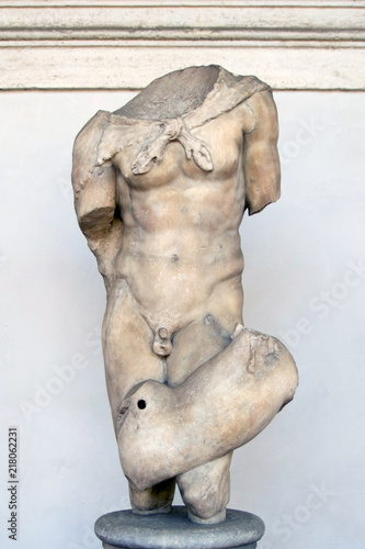 Ancient sculpture of a Satyr in the the public Baths of Diocletian in Rome, Italy. It was built from 298 to 306