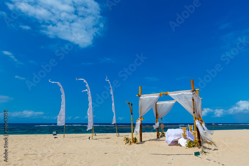 Romantic dinner place at ocean sand beach,Nusa Dua,Bali island,Indonesia photo