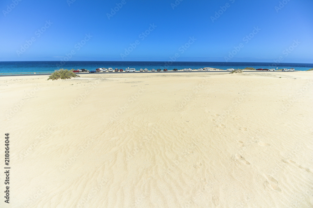 Dunas de Corralejo, sand dunes with sea, Fuerteventura Dunas de Corralejo, sand dunes with sea, Fuerteventura