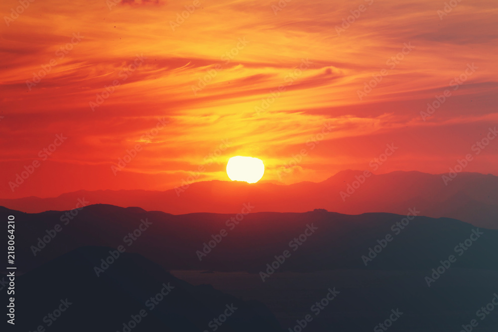 Fototapeta premium Natural Sunset Sunrise Landscape Under Scenic Colorful Sky At Sunset Dawn Sunrise. Sun Over Skyline, Horizon. Warm Colours.