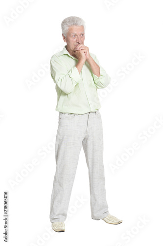 Portrait of a senior man posing isolated