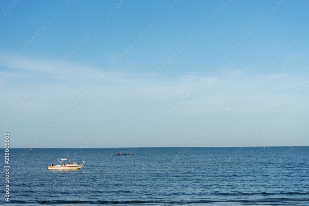 blue sea and clear blue sky background, with copy space for text