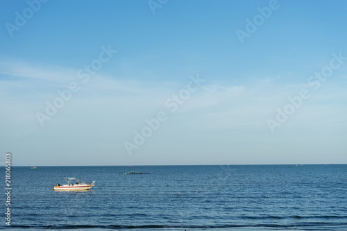 blue sea and clear blue sky background, with copy space for text
