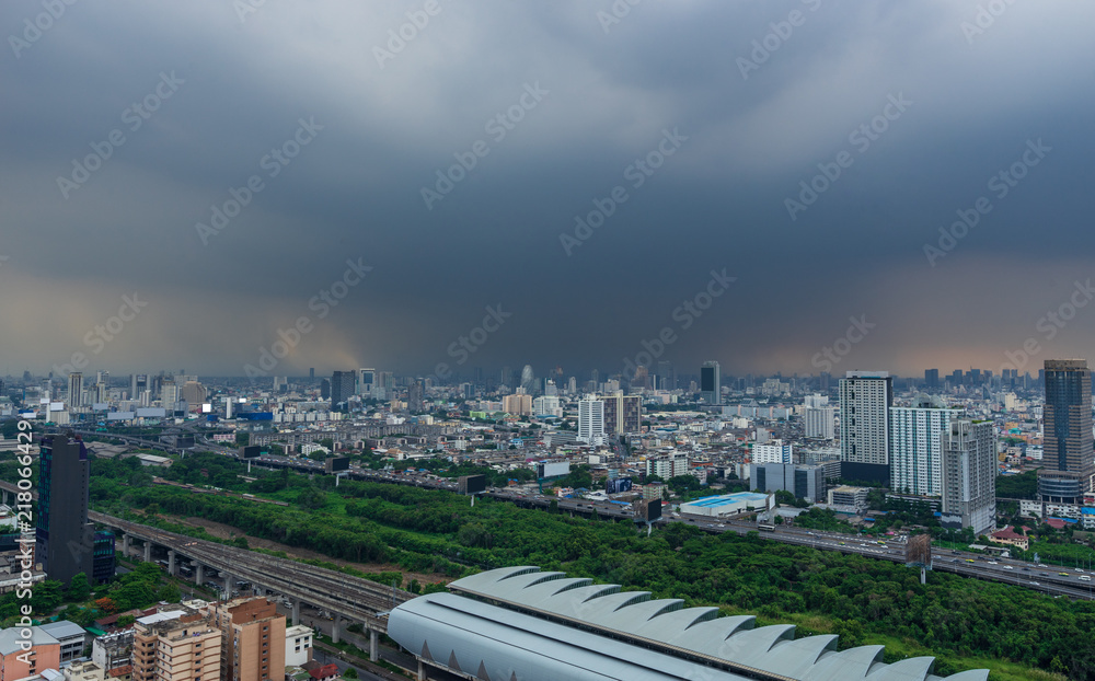 scenic of rainy sky with cityscape building and train railway
