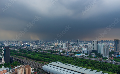 scenic of rainy sky with cityscape building and train railway © bank215