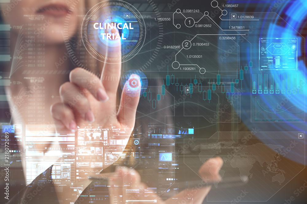 The concept of business, technology, the Internet and the network. A young entrepreneur working on a virtual screen of the future and sees the inscription: Clinical trial The concept of business, technology, the Internet and the network. A young entrepreneur working on a virtual screen of the future and sees the inscription: Clinical trial