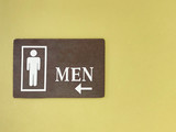 Man or men wooden restroom sign