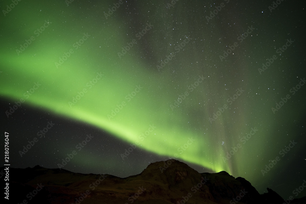 Aurora borealis  and Hrafnatindar mountain at Vik campground Iceland