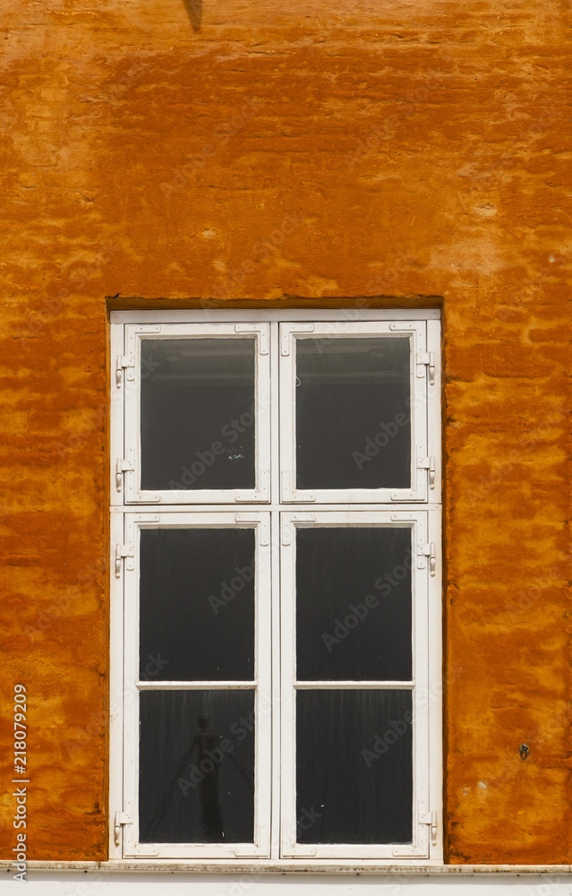 Window on the colorful facade Window on the colorful facade