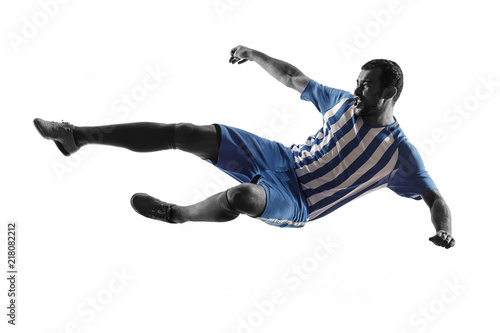 Professional football soccer player in action or movement isolated on white studio background