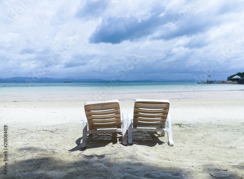 white plastic chair in the beach, Koh Talu beautiful island, Tropical Holiday, Thailand. © linyoklin