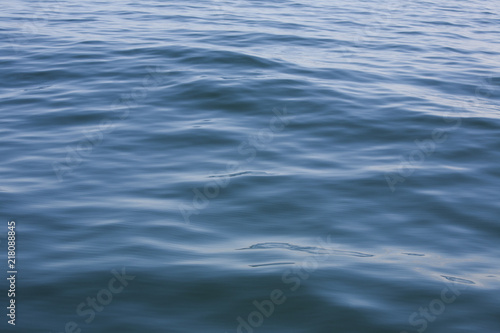 Clean smooth ripples in the deep blue sea. The gulf of Thailand. 