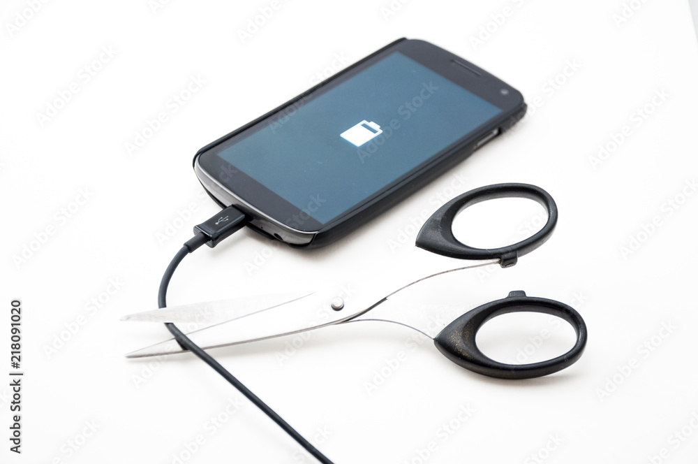 Scissors and phone Scissors and phone