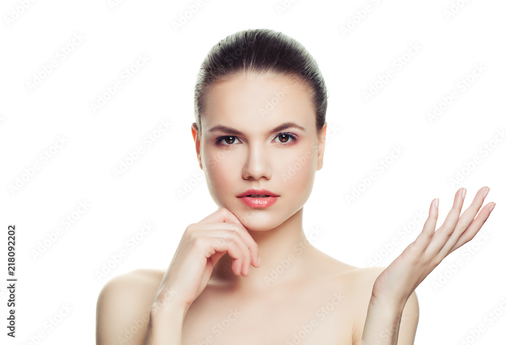 Spa model woman showing empty copy space on the open hand isolated on white background