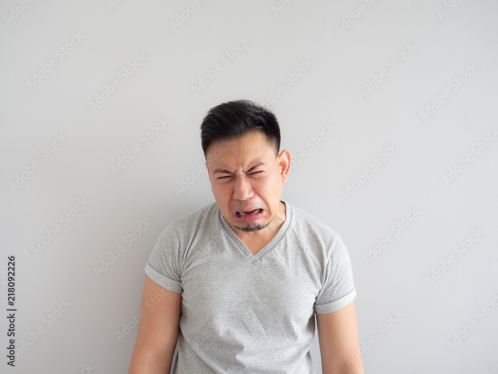 Obraz premium Funny face of man denying something.e donuts and puff pie.