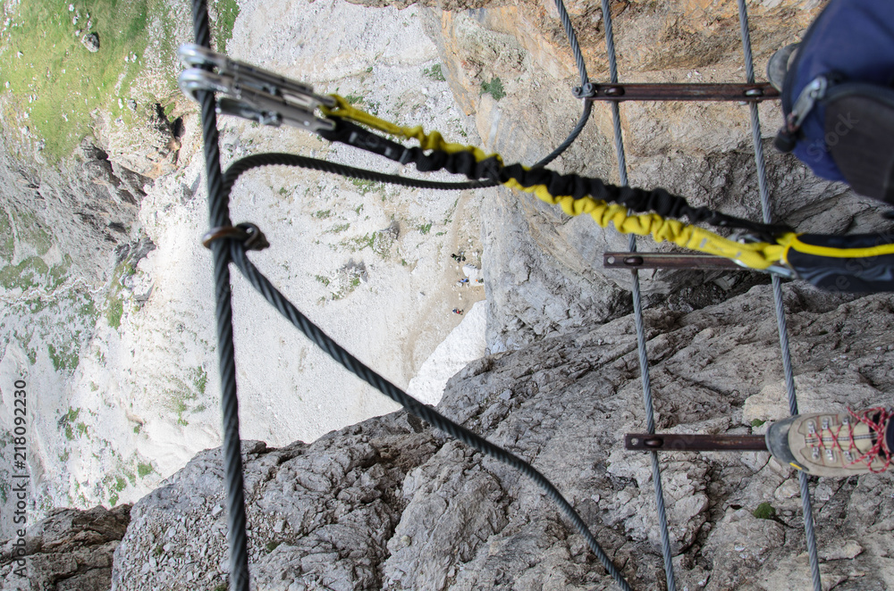 Climber on via ferrata, cesare piazzetta, dolomites, italy. Climber on via ferrata, cesare piazzetta, dolomites, italy.