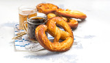 Beer and pretzels on white