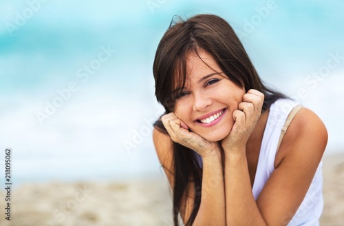 Portrait of a Smiling Woman at the Beach