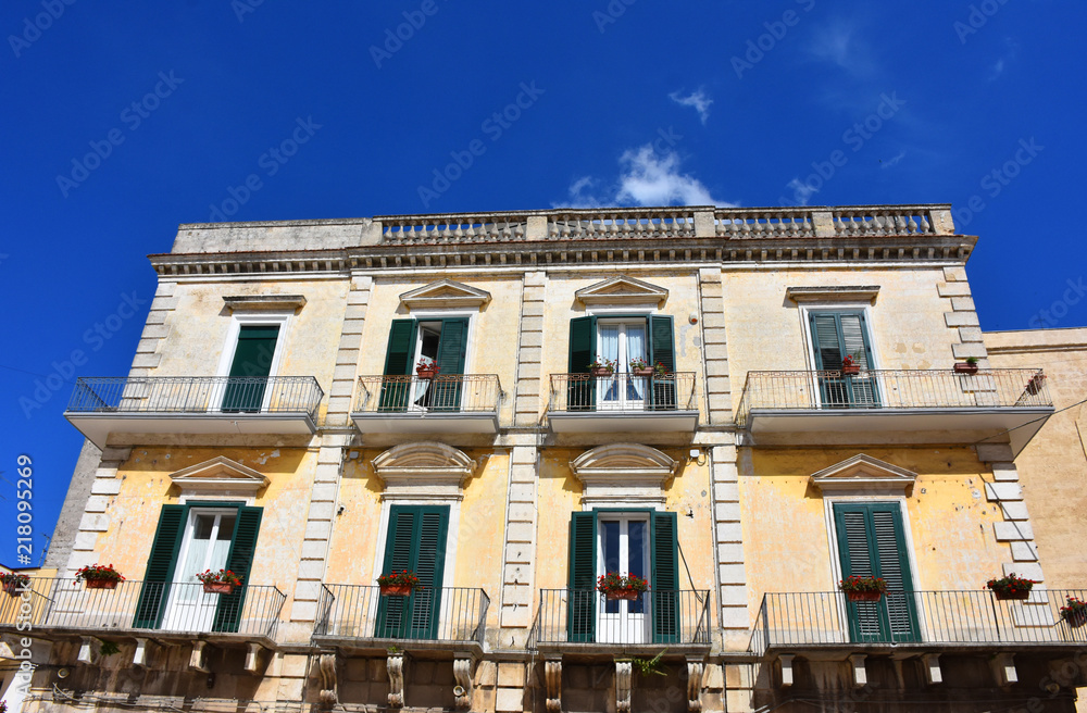Italy, Puglia region, Altamura,  view and details of palaces, alleys, churches, doors, windows, balconies and various architecture of the historic center.