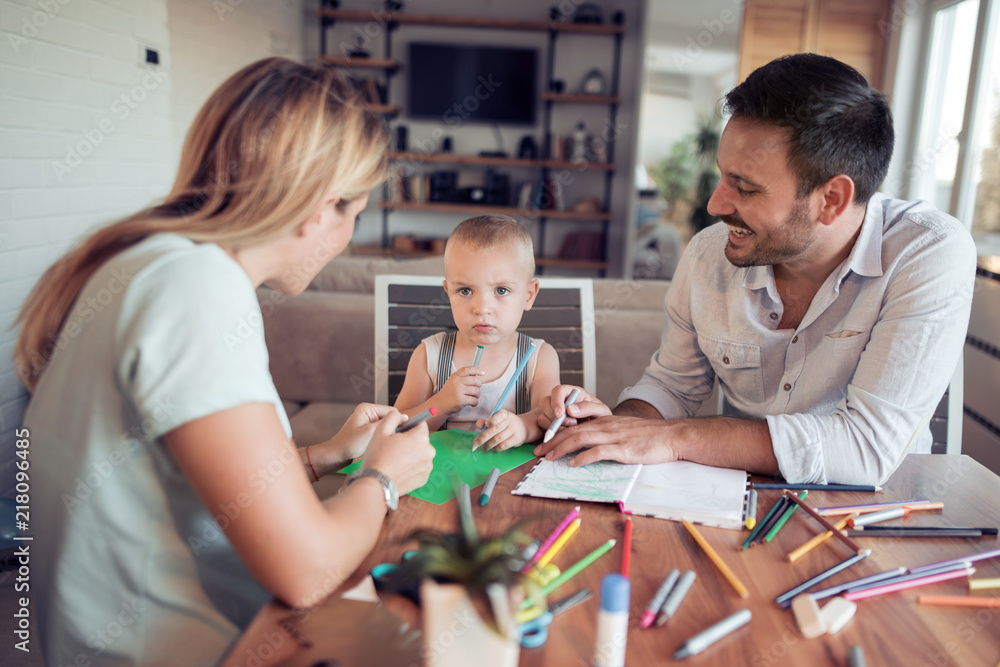 Young parents with child draw Young parents with child draw