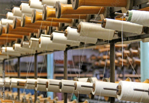The Cotton Spools on a Vintage Textile Machine.