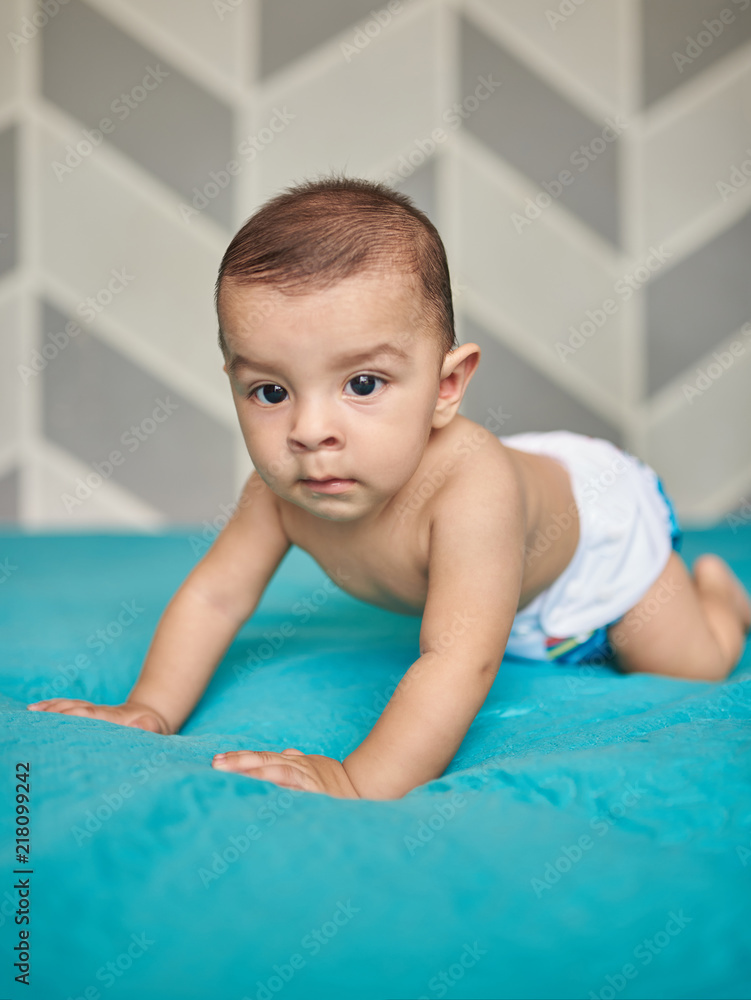 Baby boy on blue bed blanket Baby boy on blue bed blanket