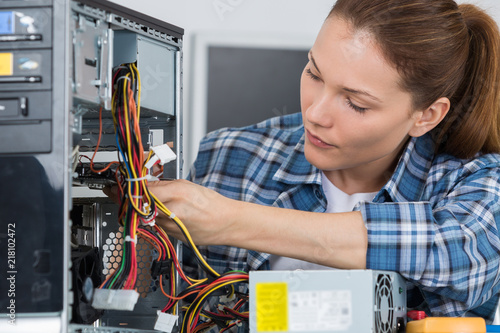 Wallpaper Mural female tests electronic equipment Torontodigital.ca