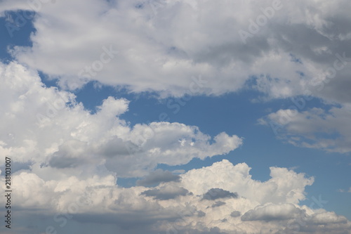 white clouds and an blue sky