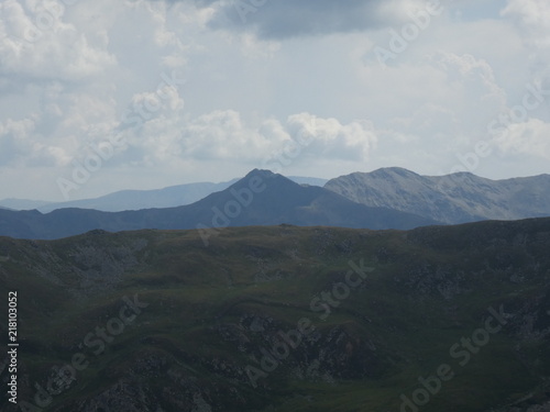 summit rock panorama landscape of the high mountains in south tyrol italy europe with clouds