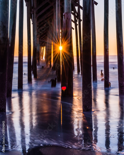 Sun through the pier 
