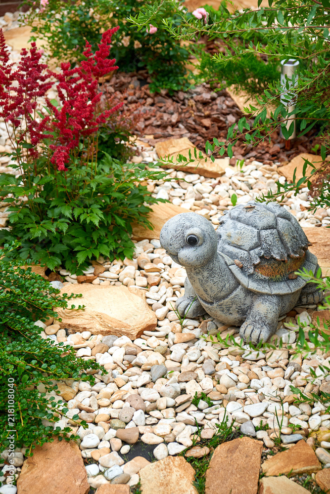 Landscape design. Flowers garden. Flowers in the garden after rain. Flowers macro. The care of garden plants Landscape design. Flowers garden. Flowers in the garden after rain. Flowers macro. The care of garden plants