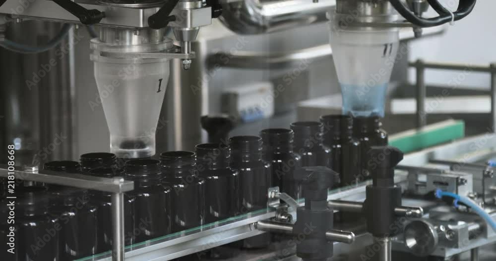 Process of production of pills, tablets. Industrial pharmaceutical concept. Factory equipment and machine. 4K Process of production of pills, tablets. Industrial pharmaceutical concept. Factory equipment and machine. 4K