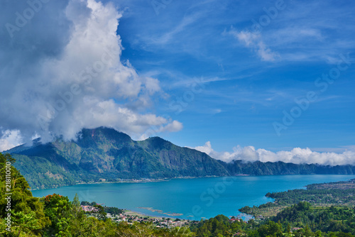Lake Buyan in Bali Island Indonesia - nature travel background. Mountain lake in the central part of Bali island. Beautiful lakes with turquoise water in the mountains. Landscape. Magnificent view.