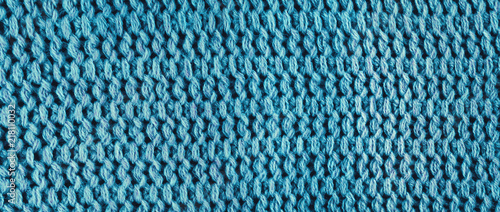 Knitted blue wool, panorama.