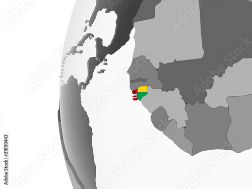 Guinea-Bissau with flag on globe