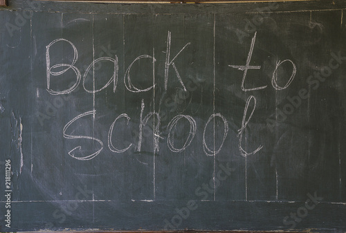 Text "Back to school"on the vintage school chalkboard