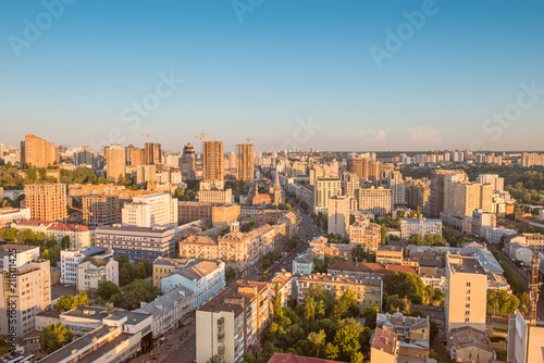 High view cityscape of Kyiv city in sunset light.