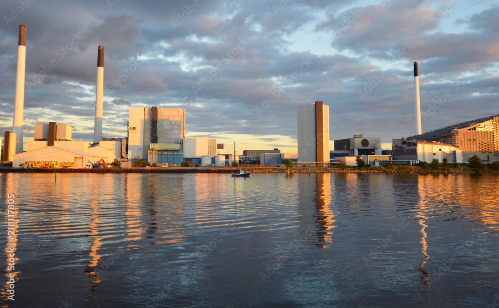 Huge power plant on the sea shore of Copenhegen during sunset