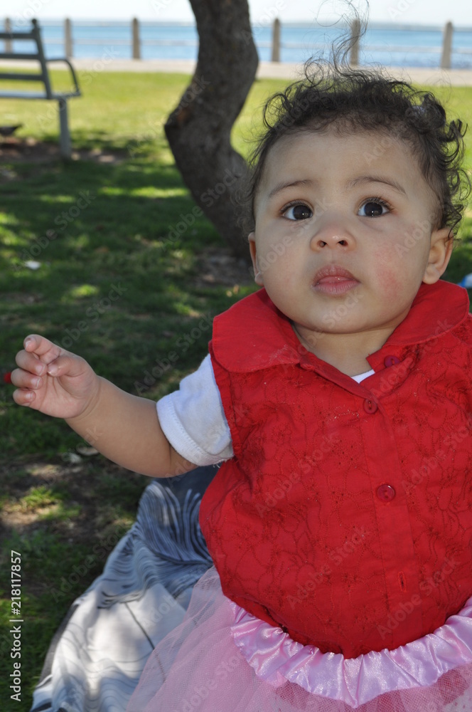 Cute baby at park having fun