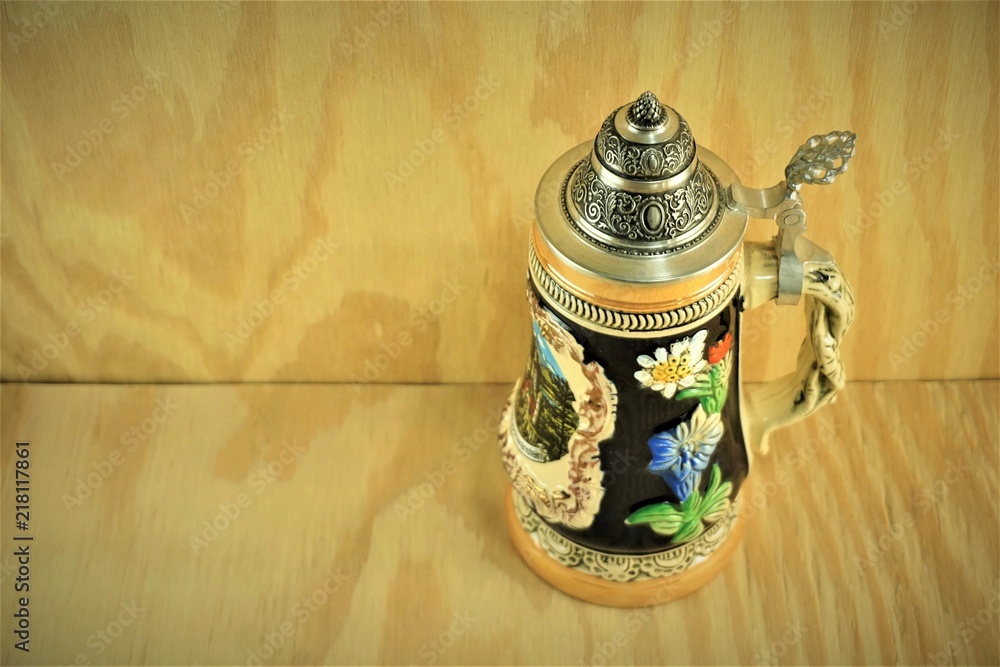 Classic German beer stein on the wooden background  , Summer in Ga USA. - obrazy, fototapety, plakaty 
