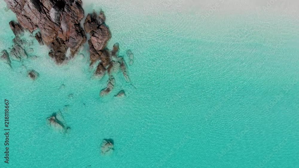 Aerial shot of beautiful calm sea and rocks Aerial shot of beautiful calm sea and rocks