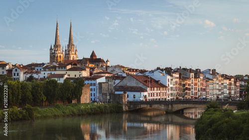 Bayonne, France cityscape view with Cathedral and Nive river photo