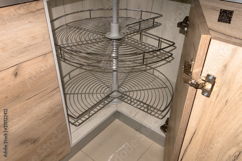 Convenient swivel metal shelves. Creative solution to fill the angular